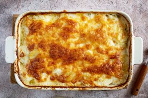 Рыба с картофелем, запеченные под майонезом
